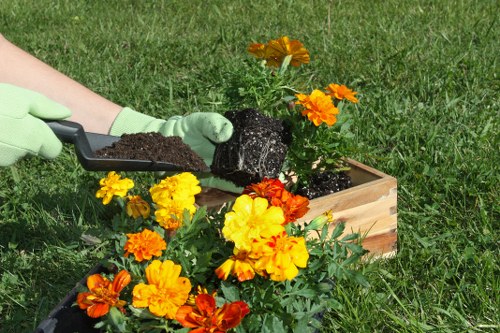 Hard landscaping features in a Norwood Green residential garden
